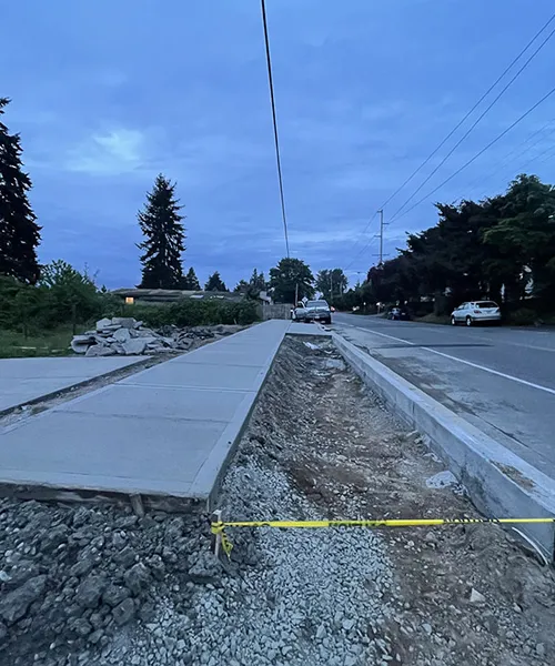 Sidewalk & curb gather concrete in Renton 